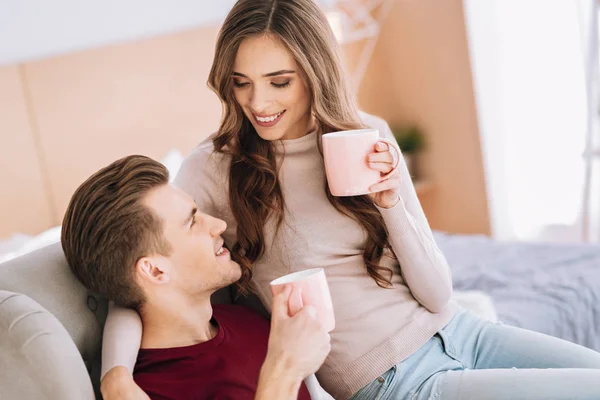 Attractive female person looking at her boyfriend — Stock Photo, Image