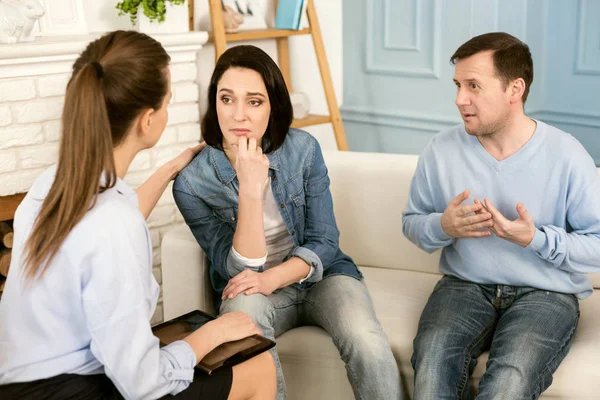 Pleasant female therapist comforting her patient — Stock Photo, Image