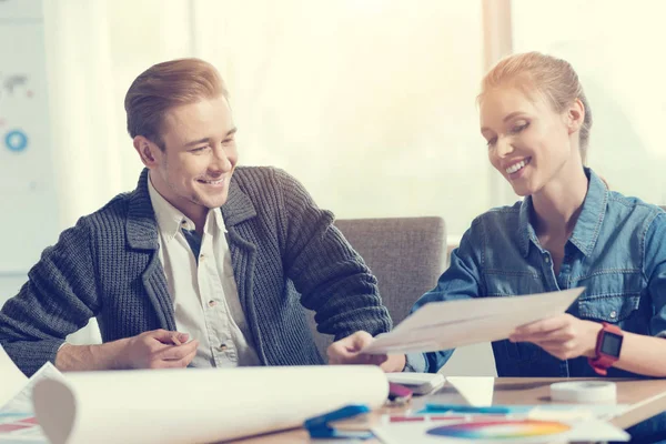 Positive delighted partners discussing their project — Stock Photo, Image