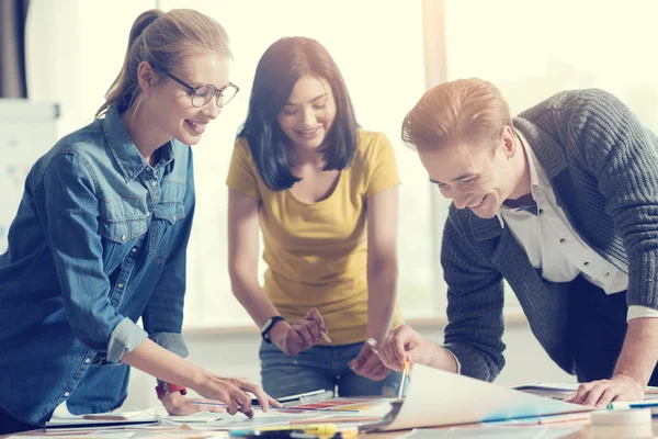 Happy male person working in friendly collective — Stock Photo, Image