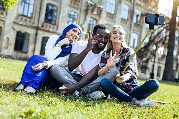 Peaceful Mind Excited Young People Smiling Broadly While Sitting Outdoors — Stock Photo, Image