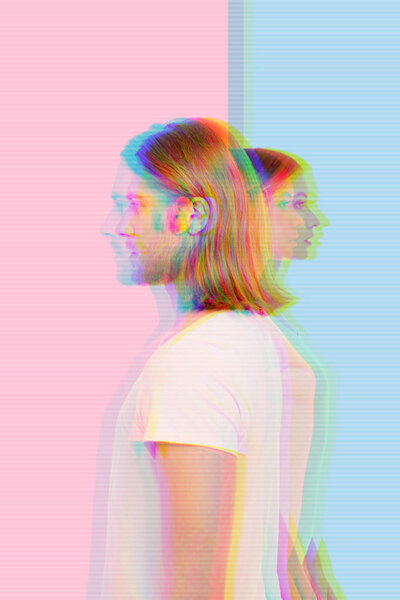 Calm people standing back to back and wearing similar clothes