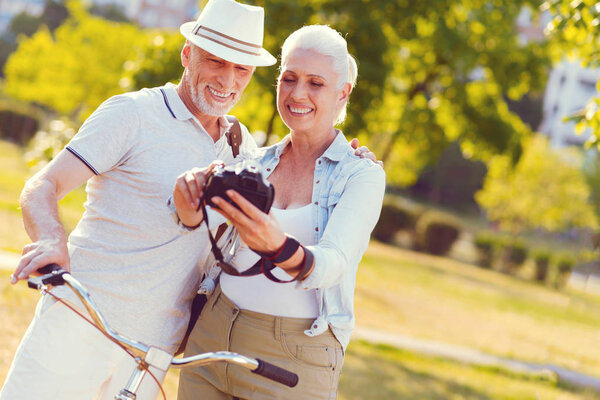 Loving senior husband and wife posing for photo together