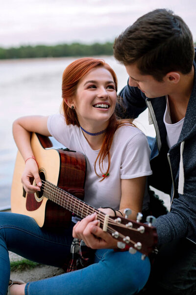 Delighted nice woman looking at her boyfriend