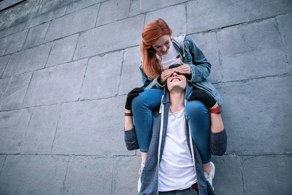 Nice positive woman closing her boyfriends eyes — Stock Photo, Image