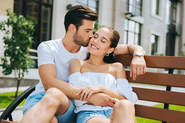 Nice handsome man kissing his wife — Stock Photo, Image