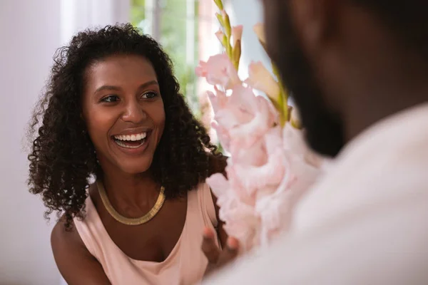 Positive delighted woman looking at her husband — Stock Photo, Image