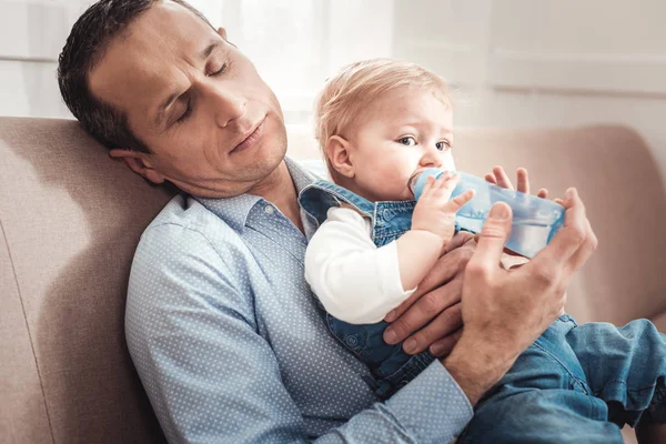 Cute hungry baby eating — Stock Photo, Image