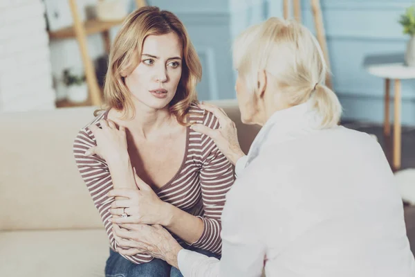 Sad depressed woman looking at her mother — Stock Photo, Image