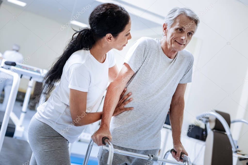 Emotional baby boomer getting help in a special rehabilitation center