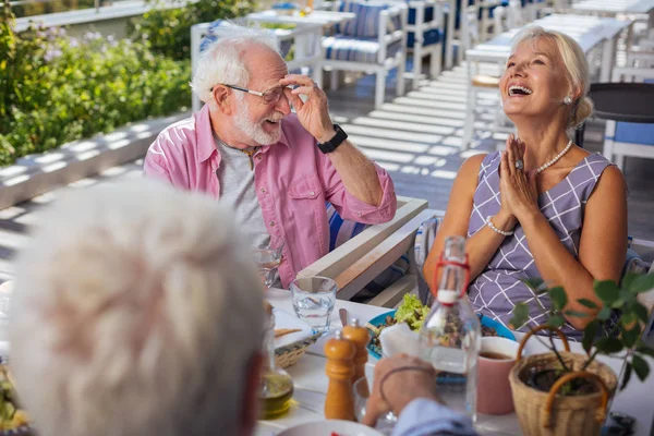 Delighted nice people telling each other jokes — Stock Photo, Image