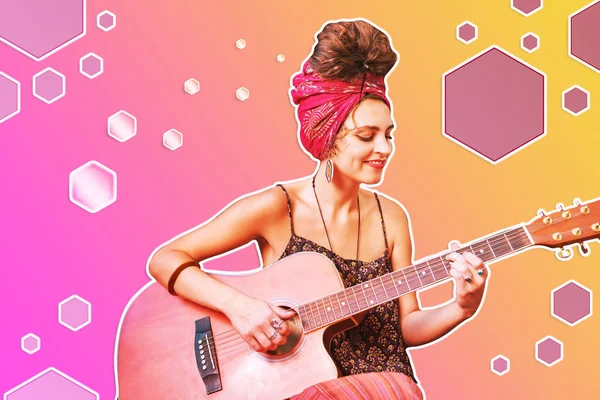 Unusual high-spirited beautiful woman playing a guitar — Stock Photo, Image