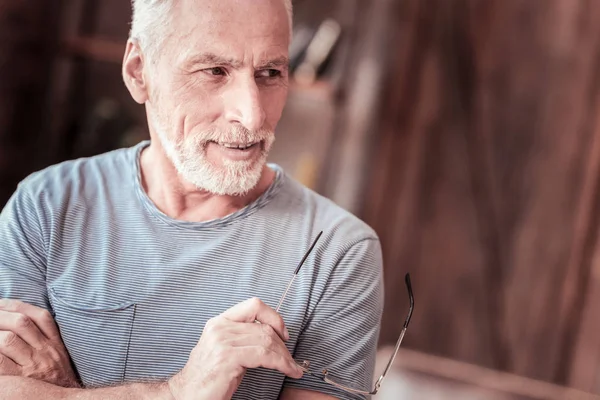 Portrait of thoughtful elderly man with glasses — Stock Photo, Image