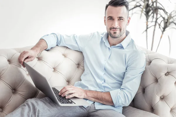 Handsome man typing message on computer — Stock Photo, Image