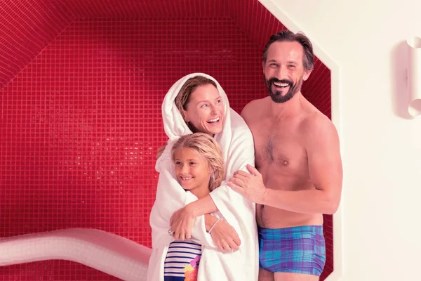 Happy joyful family standing together after swimming — Stock Photo, Image