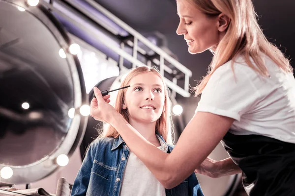 Delighted kid preparing for her birthday party — Stock Photo, Image