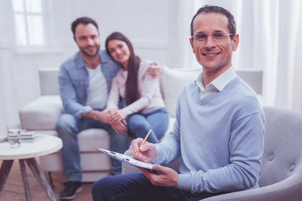 Delighted psychiatrist being pleased with his work — Stock Photo, Image