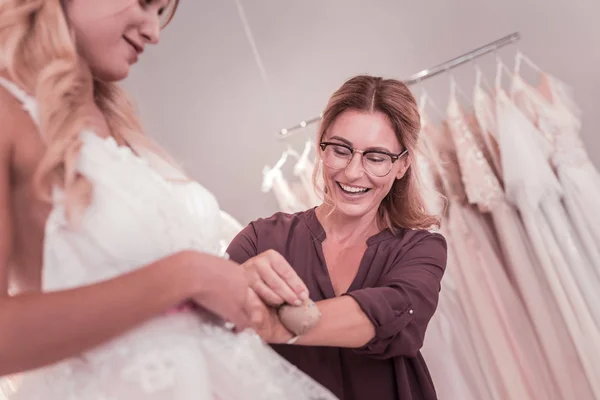 Low angle of a cheerful positive wedding designer — Stock Photo, Image