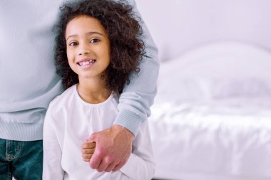 Close up of happy child that posing on camera clipart