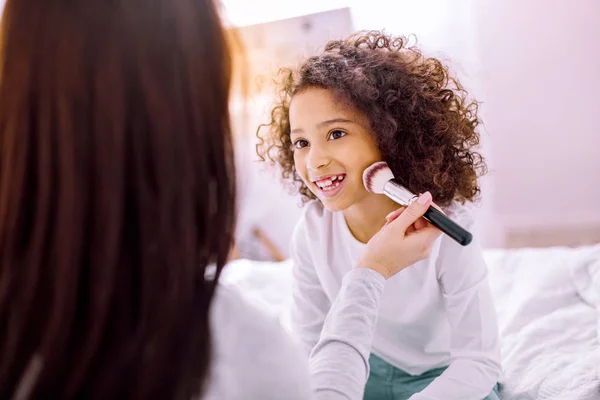 Charming brunette kid spending time with pleasure — Stock Photo, Image