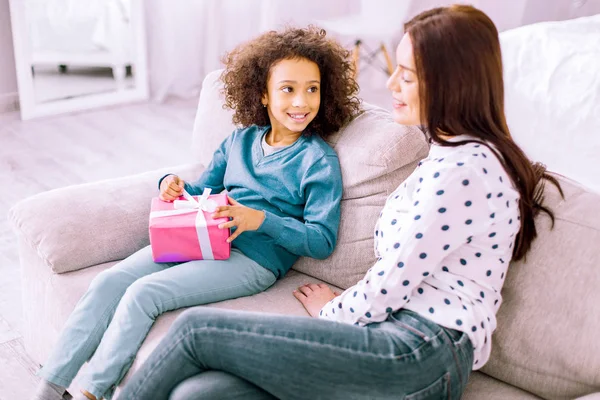 Amazing female person listening to her kind child — Stock Photo, Image