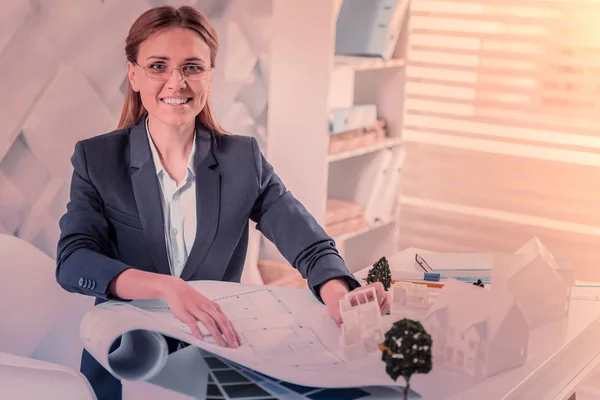 Positive delighted engineer working at her project — Stock Photo, Image