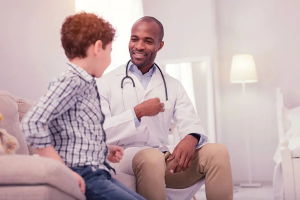 Joyful good looking man enjoying his job — Stock Photo, Image