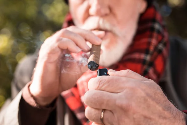 Selective focus of a lighter being in use — Stock Photo, Image