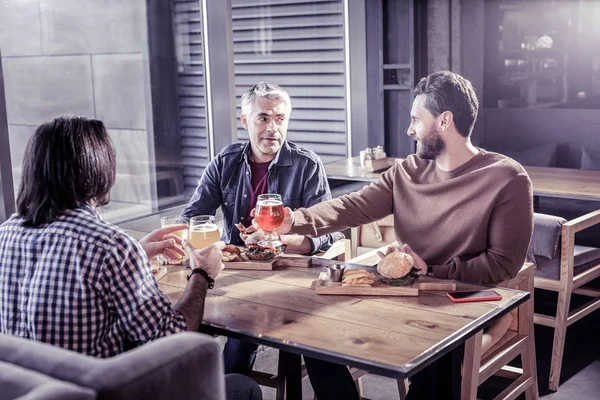 Relaxed coworkers visiting cafe after working day — Stock Photo, Image