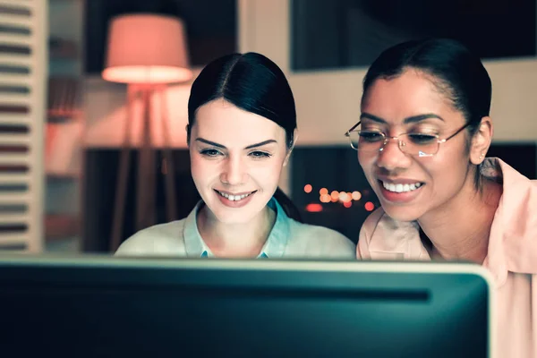 Initiative women staying at office till evening — Stock Photo, Image