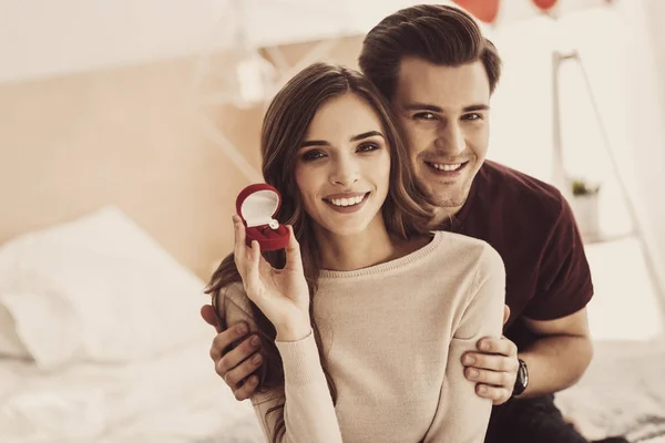 Future wife showing her luxurious engagement ring to her relatives — Stock Photo, Image