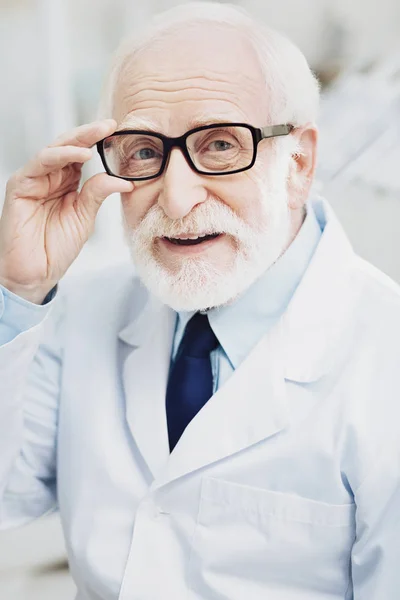 Positive male doctor welcoming patient — Stock Photo, Image