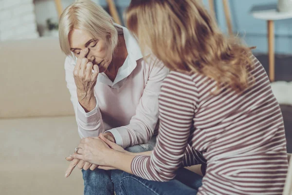 Elderly woman having a headache — Stock Photo, Image