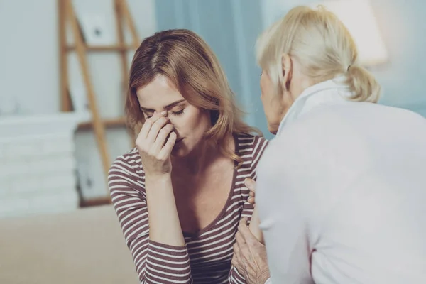 Young woman complaining about headache — Stock Photo, Image