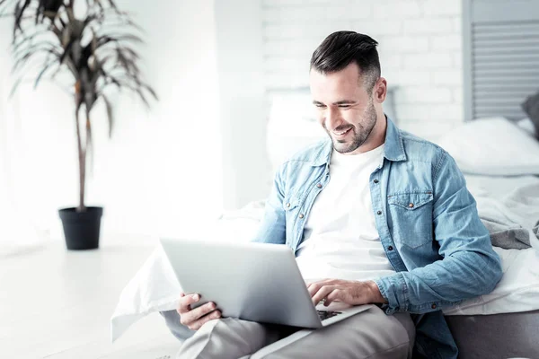 Joyful brunette working with pleasure — Stock Photo, Image