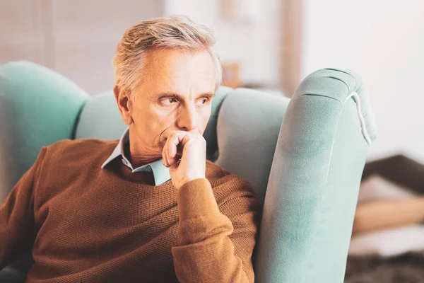 Retired engineer feeling thoughtful thinking about changes
