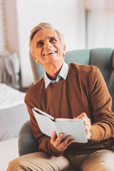 Financial director feeling happy after calculating numbers