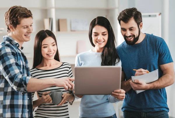 Team of four creative designers preparing new project — Stock Photo, Image