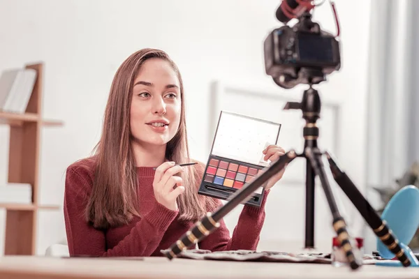 stock image Young lady recordering a video