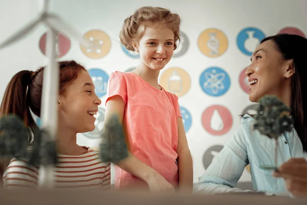 Pretty blonde girl keeping smile on her face — Stock Photo, Image