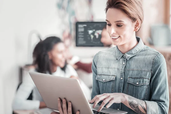 Amazing young female person working with pleasure — Stock Photo, Image