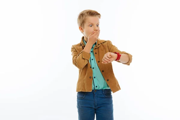 Nice surprised young boy covering his mouth — Stock Photo, Image