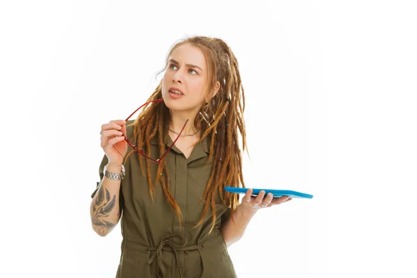 Pleasant thoughtful woman taking her glasses off — Stock Photo, Image