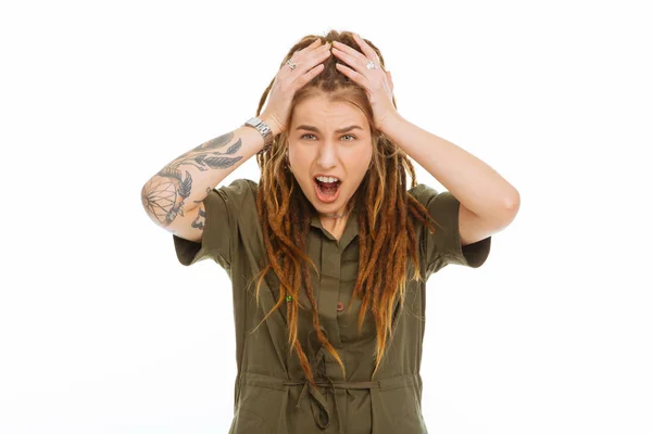 Unhappy emotional young woman holding her head — Stock Photo, Image