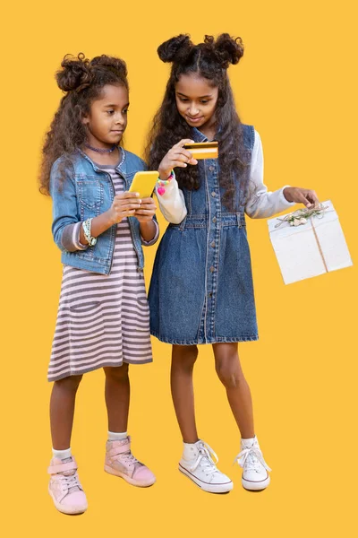 Pleasant Surprise Nice African American Girls Standing Together While Buying — Stock Photo, Image