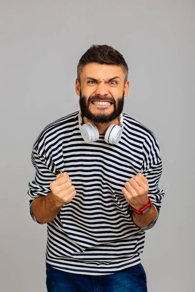 Joyful nice positive man expressing his emotions — Stock Photo, Image