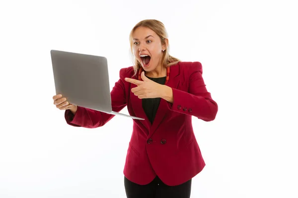 Delighted cheerful businesswoman pointing at the screen — Stock Photo, Image