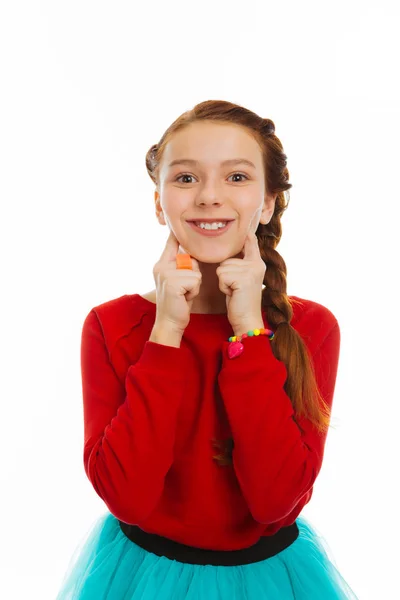 Pretty smiley girl pressing her cute cheeks — Stock Photo, Image