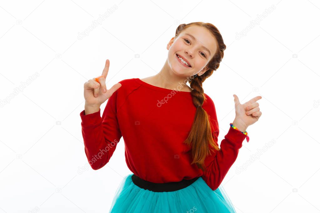 Cheerful happy nice girl experiencing positive emotions