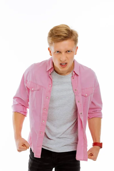 Emotional young blonde man feeling very angry — Stock Photo, Image